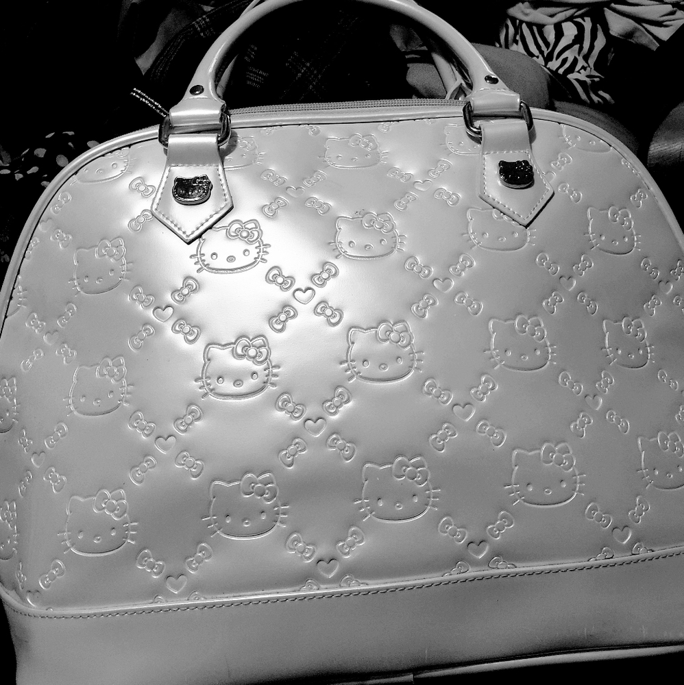 Pristine Hello Kitty faux patent leather bag.